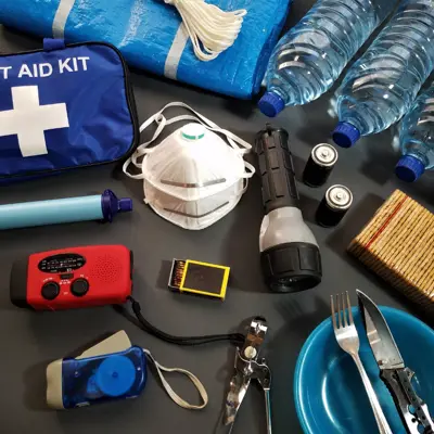 A large pile of sandbags being prepared