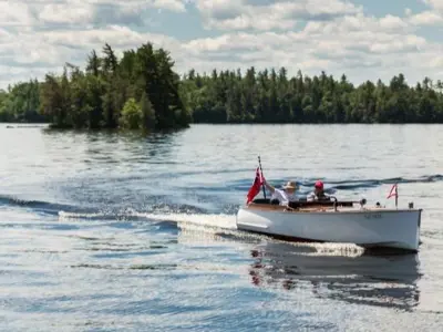 A motorboat driving across a lake