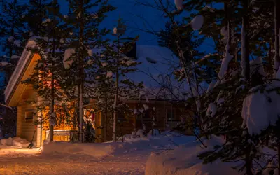 Cottage in the forest during the winter